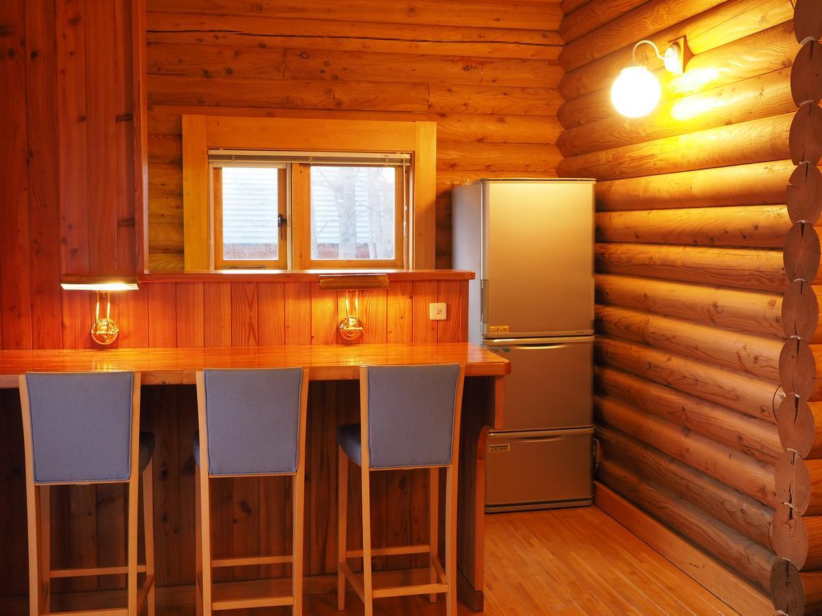 Log Hotel Larch Lake Kanayama Minamifurano Habitación foto