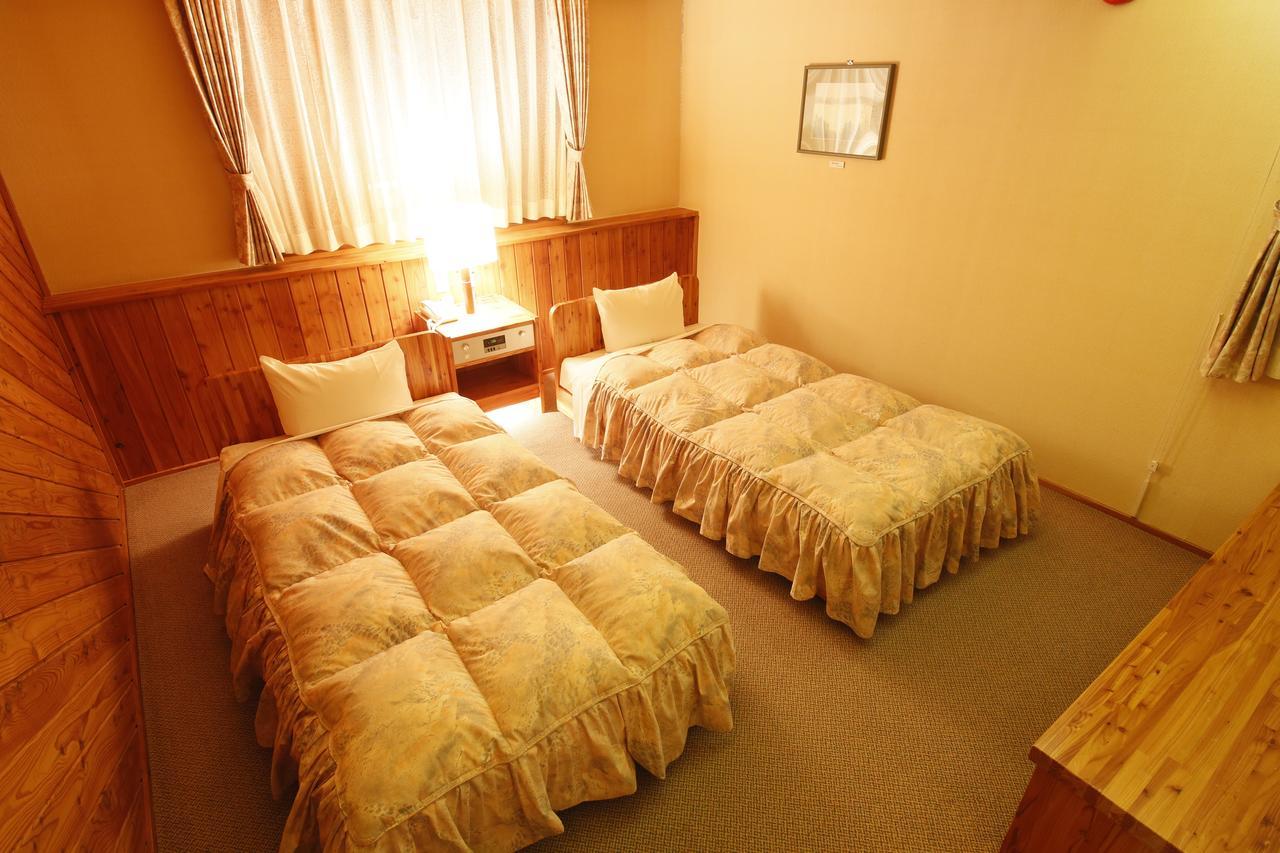 Log Hotel Larch Lake Kanayama Minamifurano Habitación foto