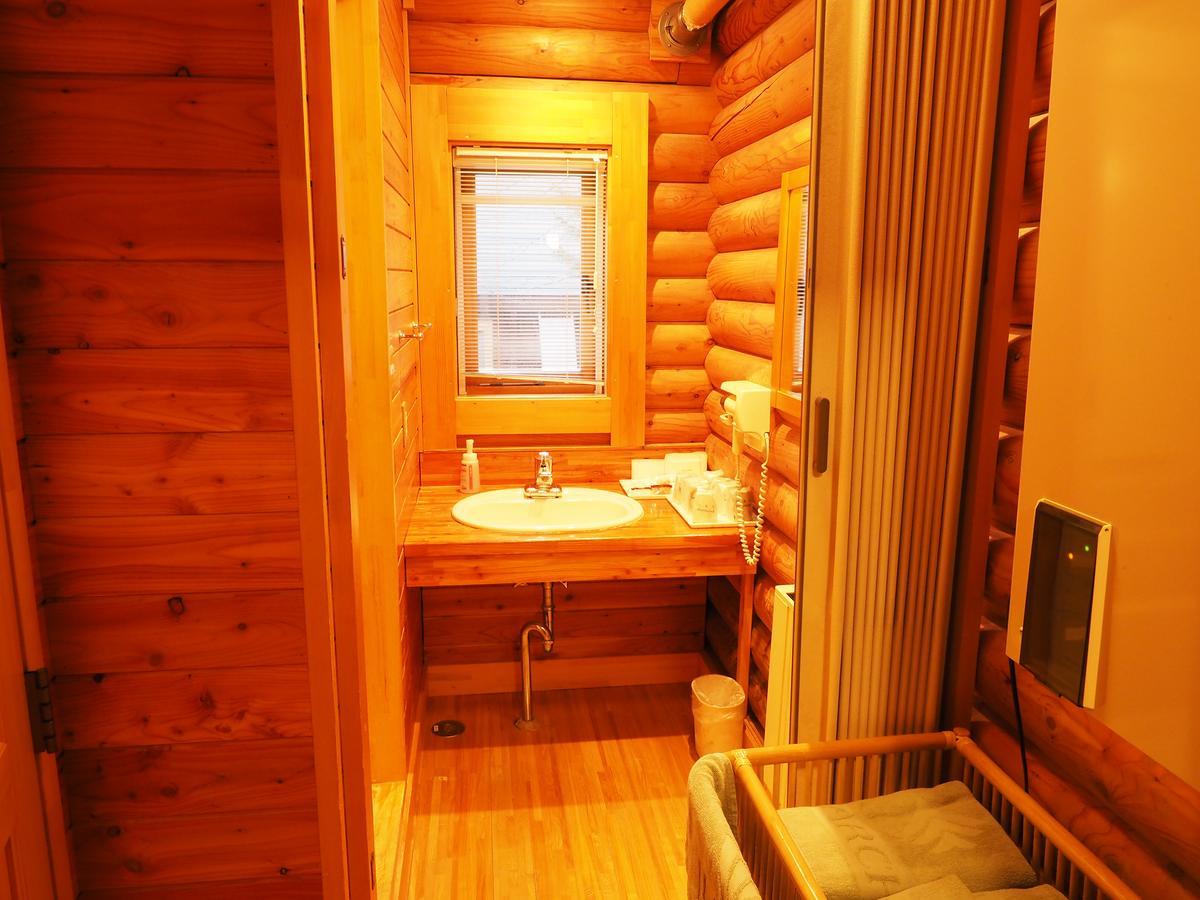 Log Hotel Larch Lake Kanayama Minamifurano Habitación foto